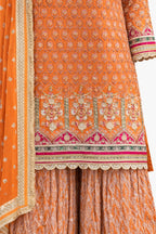 Close-up of zari and sequin embroidery on orange sharara kameez – Khush Mizaj