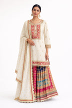 Model wearing ivory sharara suit with multicolour panels – Khush Mizaj