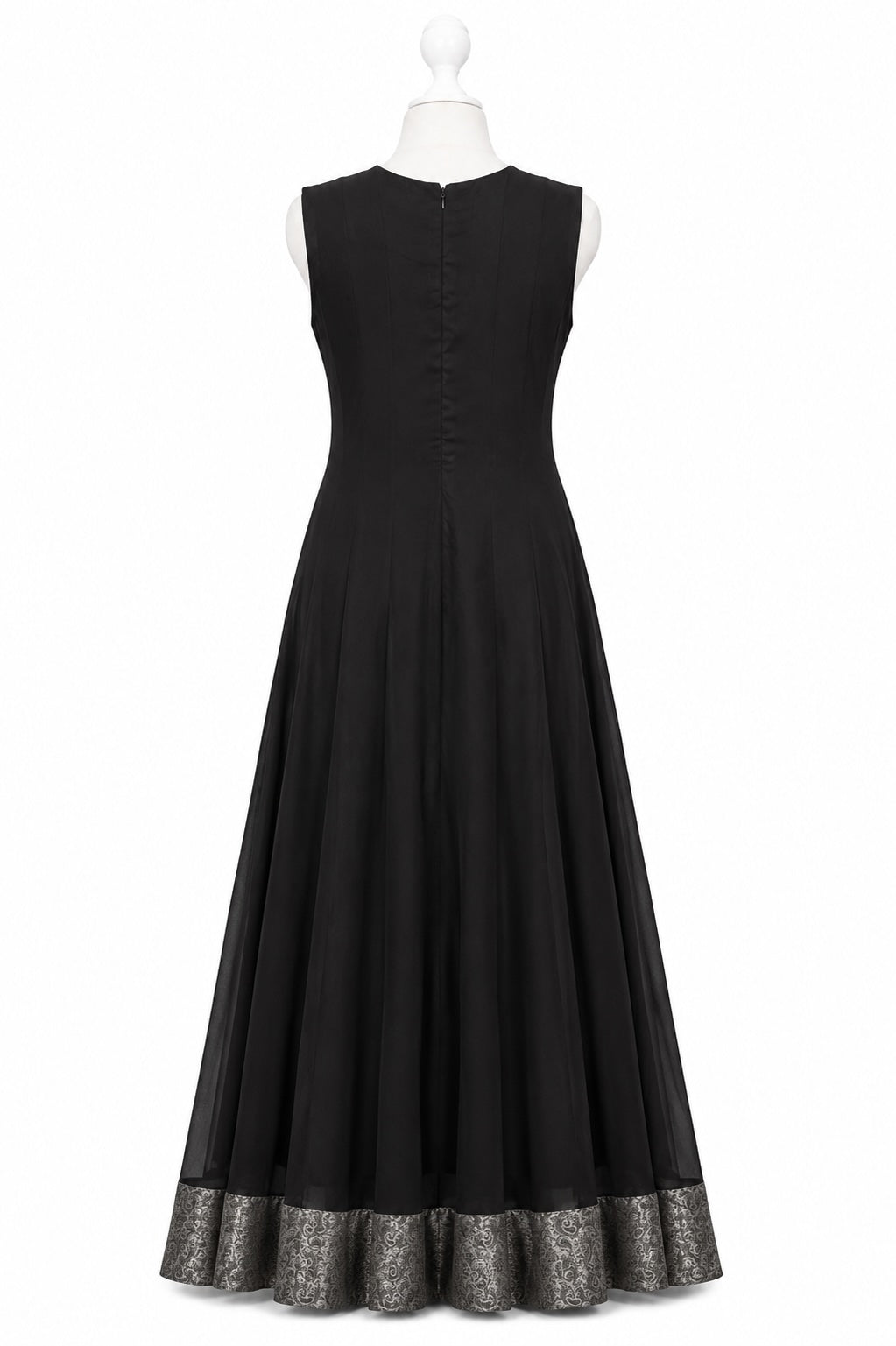 Black dress with lace trim on a white background