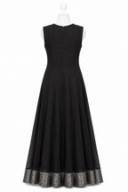 Black dress with lace trim on a white background