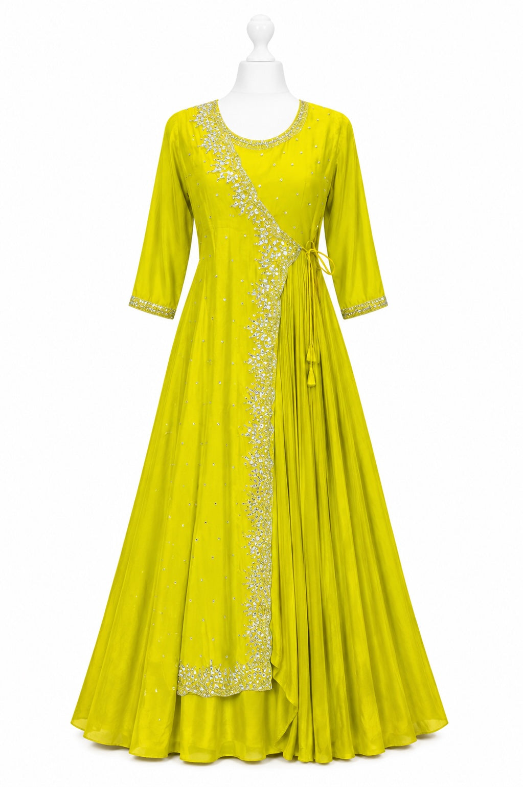 Yellow dress with intricate embroidery on a white background