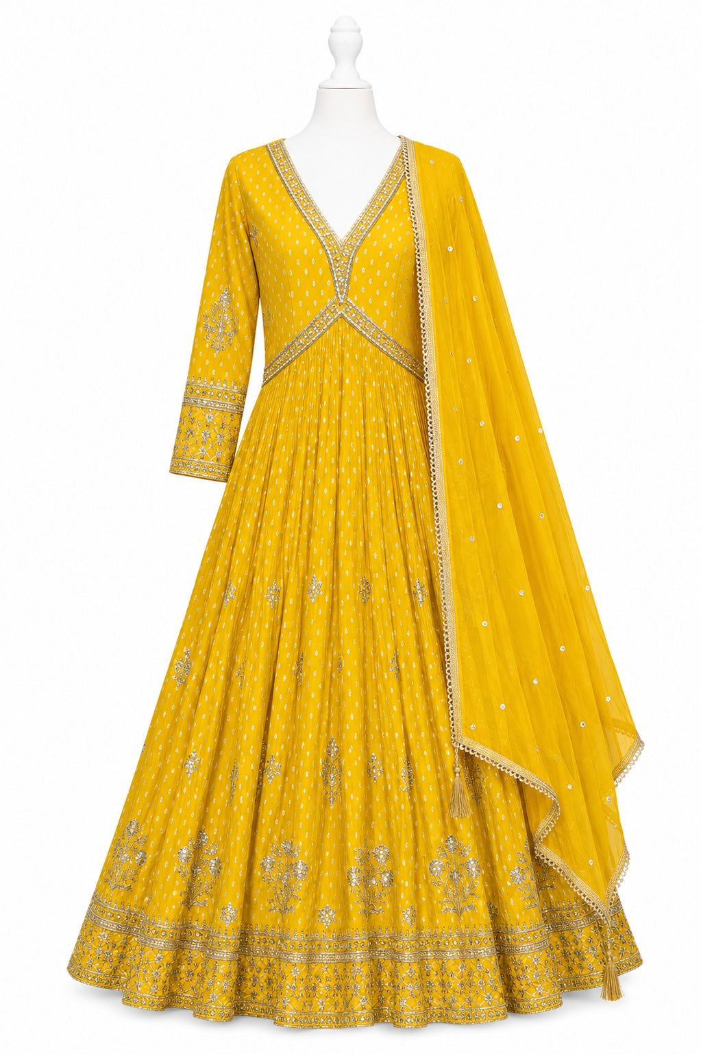 Yellow embroidered anarkali suit on a mannequin with a white background