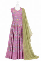 Pink floral dress with a green dupatta on a white background
