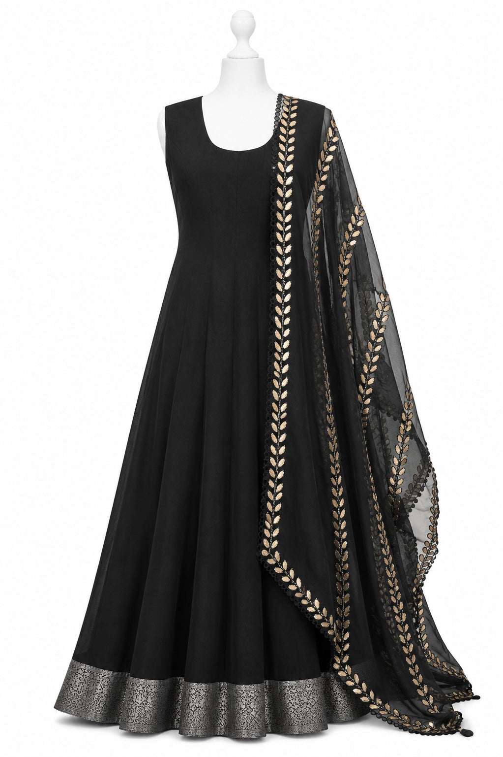Black dress with gold embroidery on a mannequin against a white background