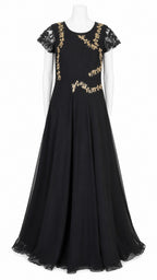 Black evening gown with gold embroidery on a white background