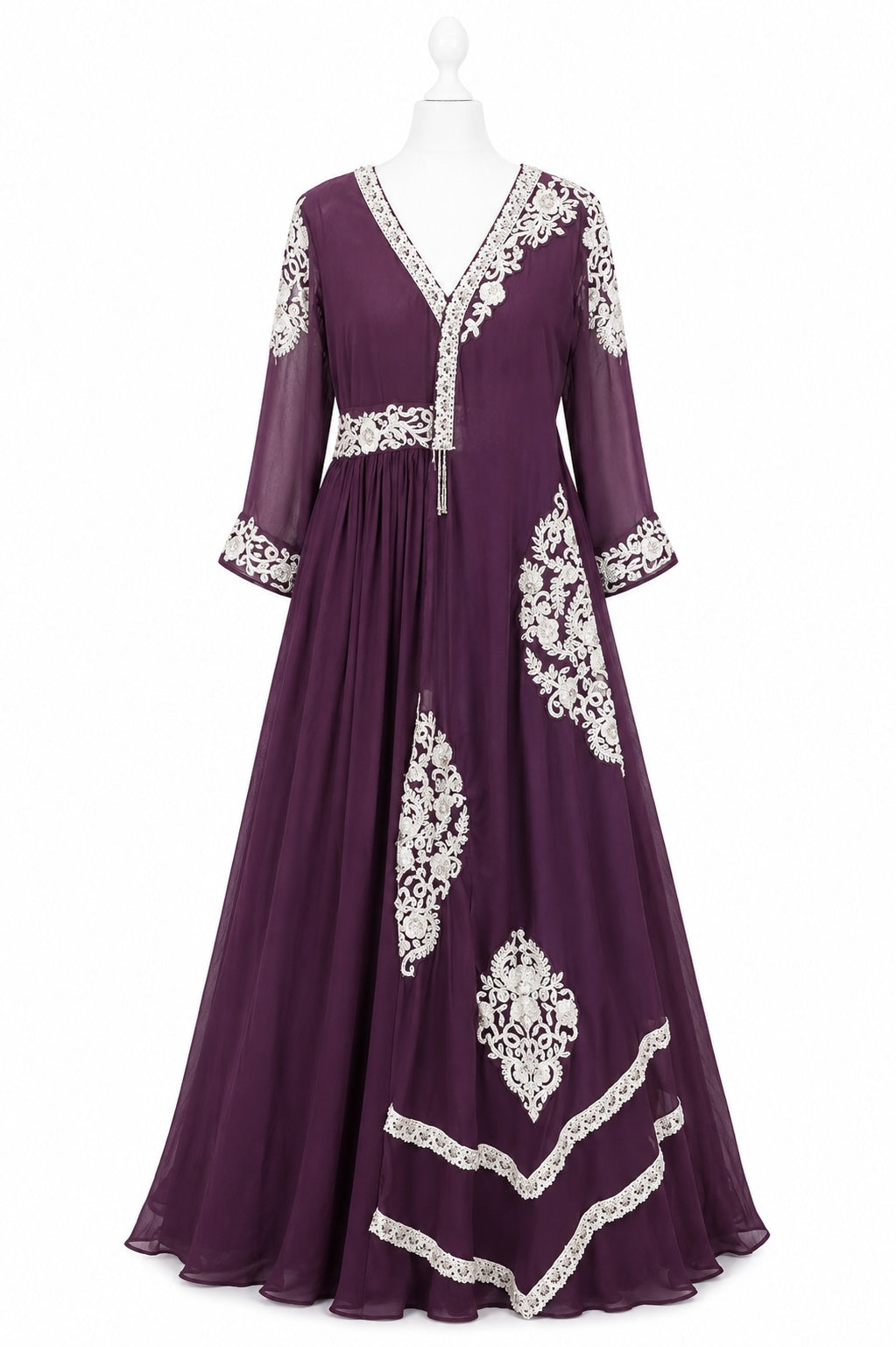 Purple dress with white lace detailing on a mannequin against a white background
