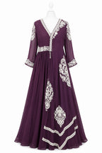 Purple dress with white lace detailing on a mannequin against a white background