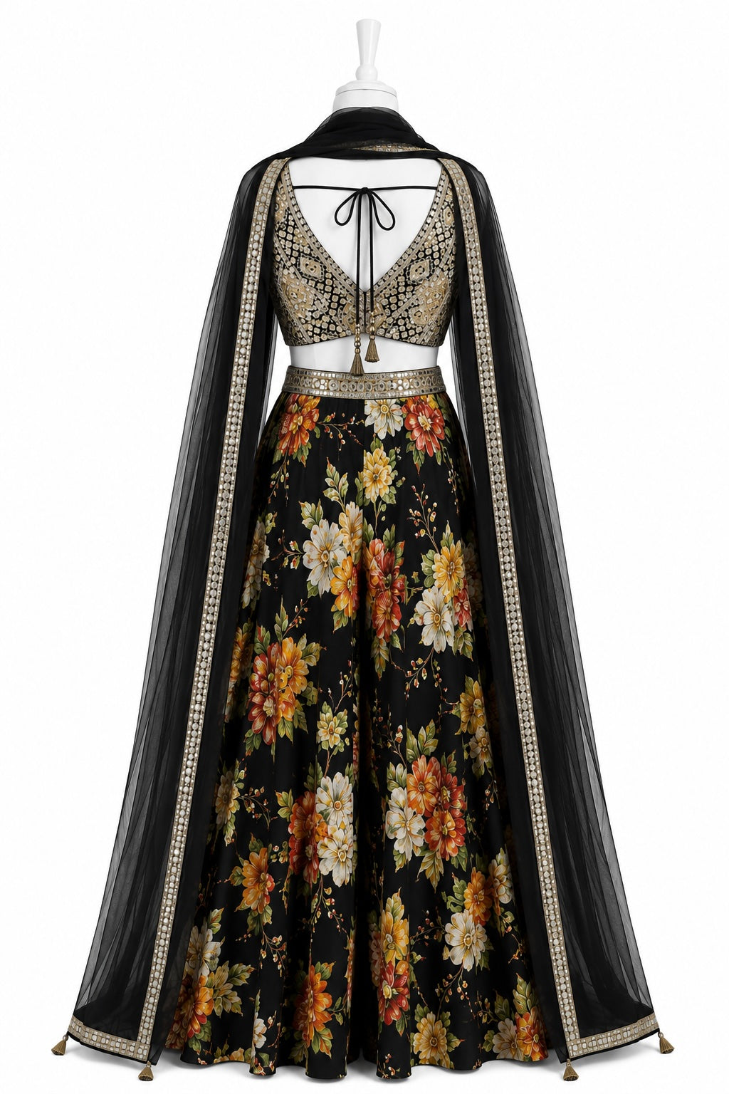 Floral dress with a black cape on a white background