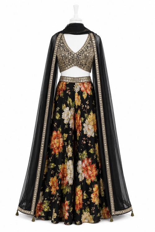 Traditional outfit with floral skirt and embroidered top on a white background