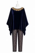 Navy velvet top and patterned pants on a mannequin against a white background