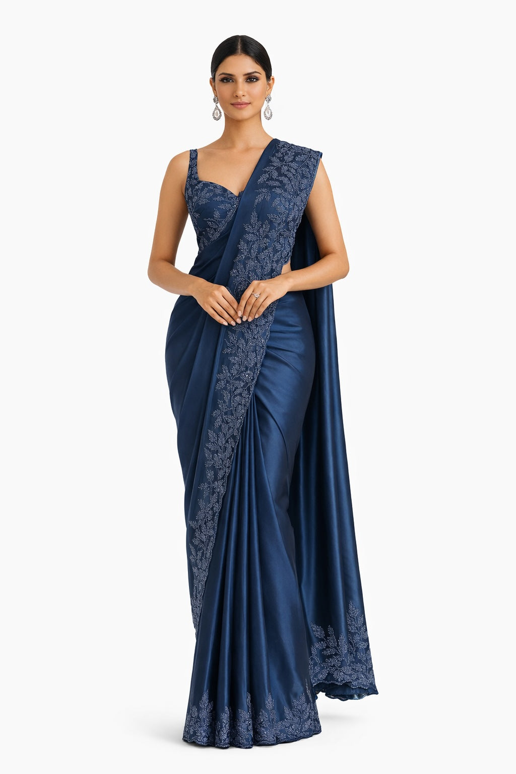Woman wearing a blue saree with a white background