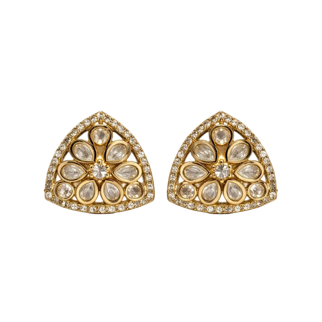 Pair of gold earrings with diamond-like stones on a white background