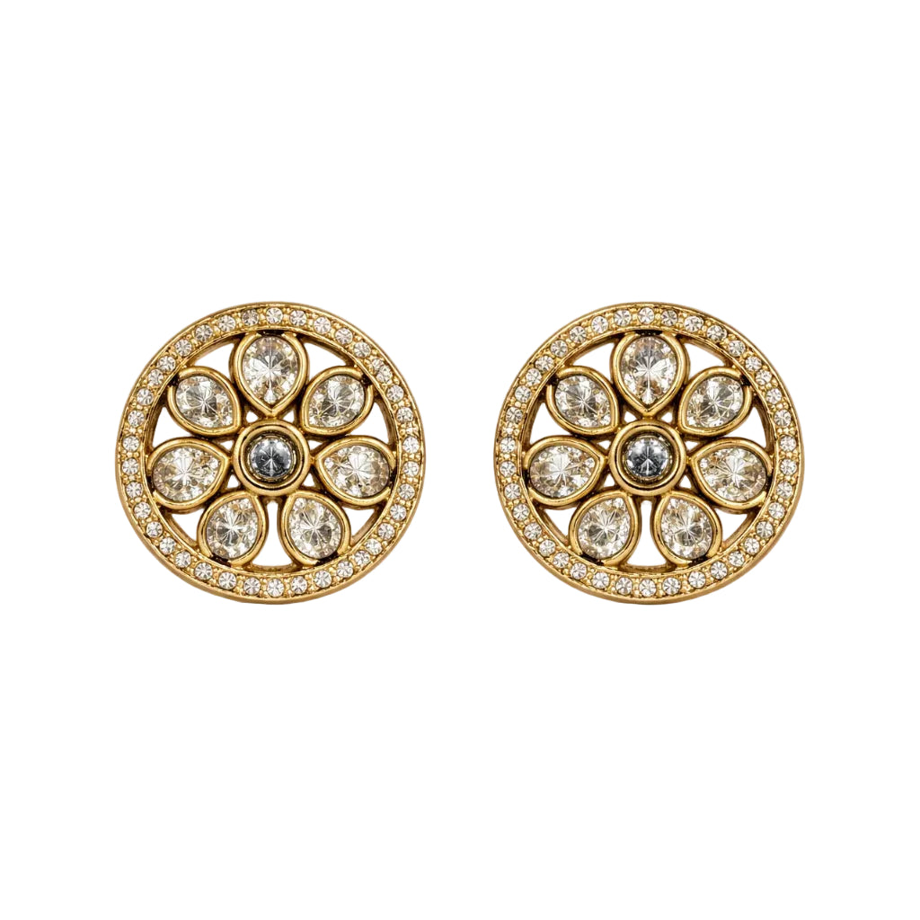 Pair of gold and diamond earrings on a white background