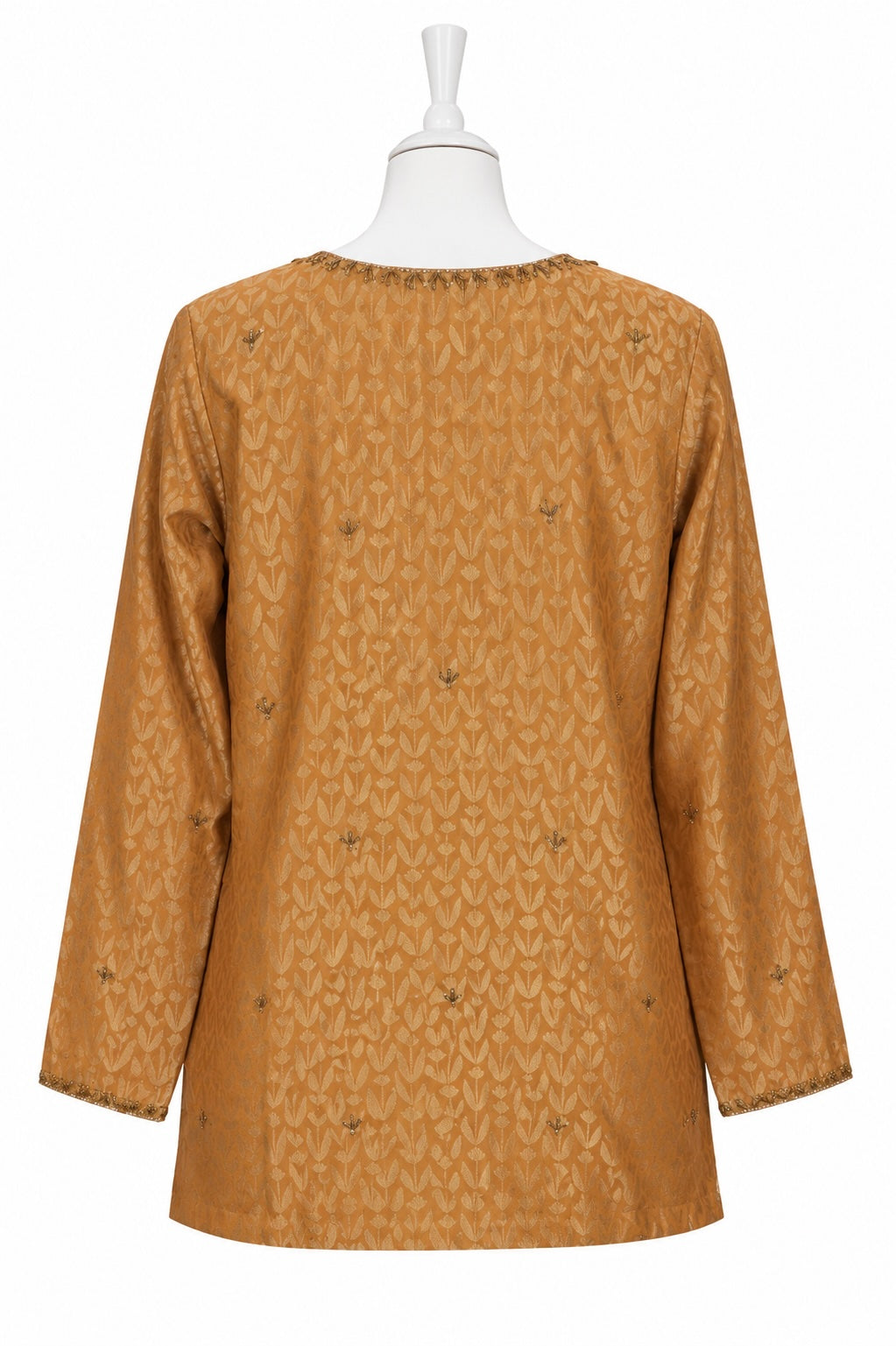 Brown patterned dress on a mannequin against a white background
