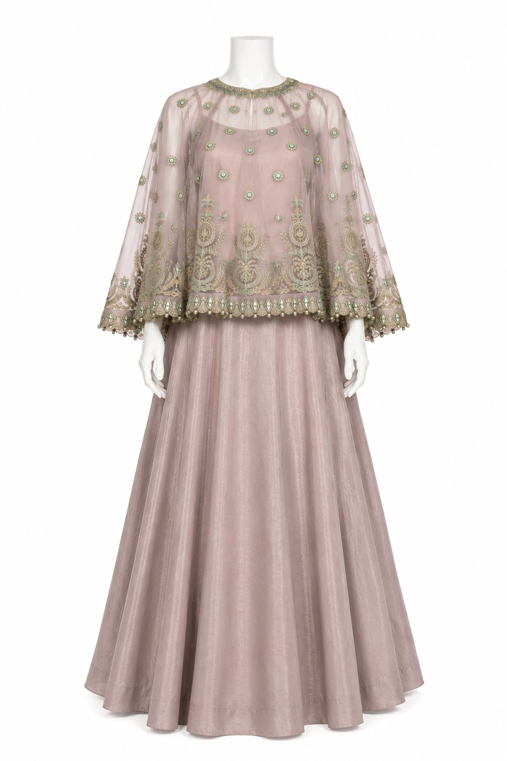 A dusty pink traditional Indian outfit displayed on a white mannequin, featuring a sheer embroidered kurta with wide bell sleeves and a matching pleated skirt.