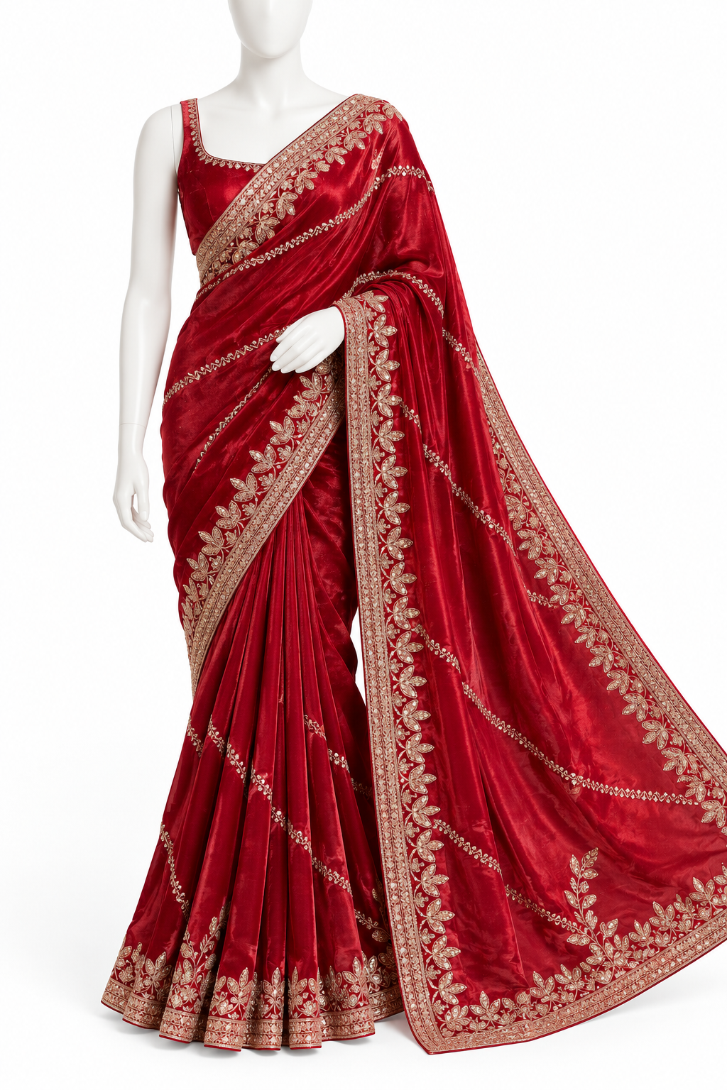 A deep red velvet saree with intricate gold floral embroidery, displayed on a white mannequin against a plain white background.