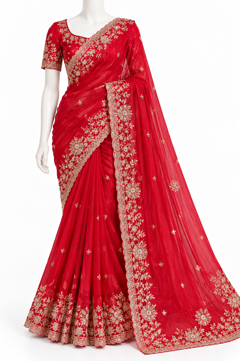 A red georgette saree with gold floral embroidery, displayed on a white mannequin against a plain white background.