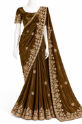 A brown velvet saree with beige floral embroidery, displayed on a white mannequin against a white background.