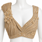 A gold beaded and embellished off-the-shoulder blouse displayed on a white mannequin torso. The blouse features intricate beadwork, sequins, and floral embroidery details.