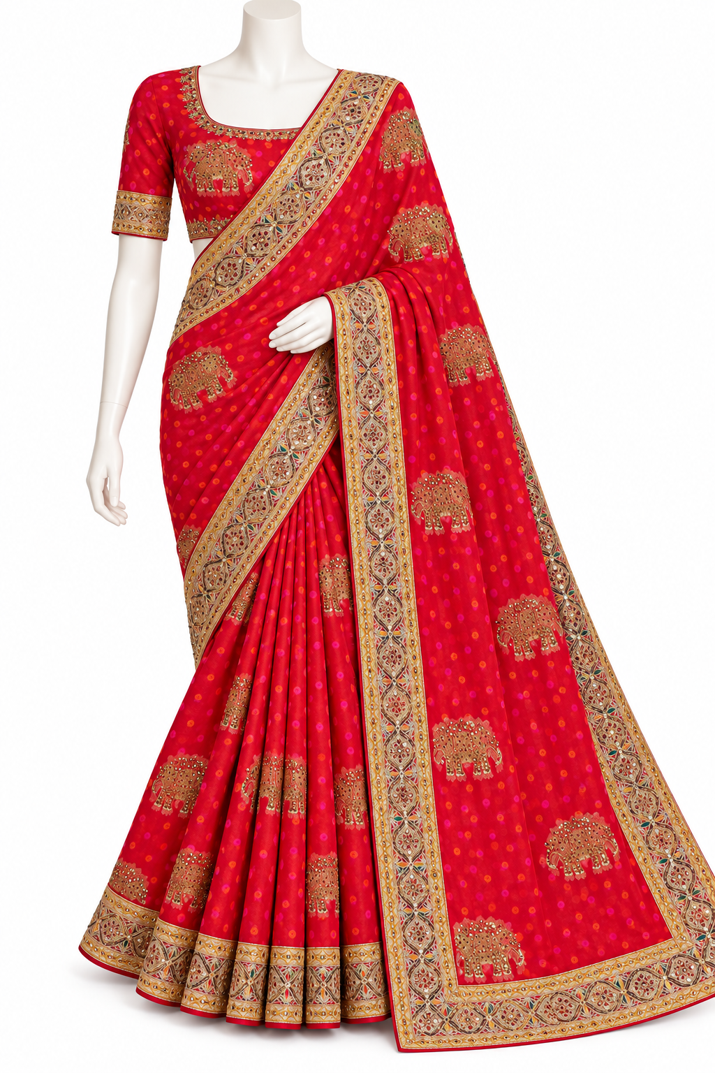 A red traditional Indian saree with gold elephant and floral motifs, displayed on a white mannequin against a plain white background.