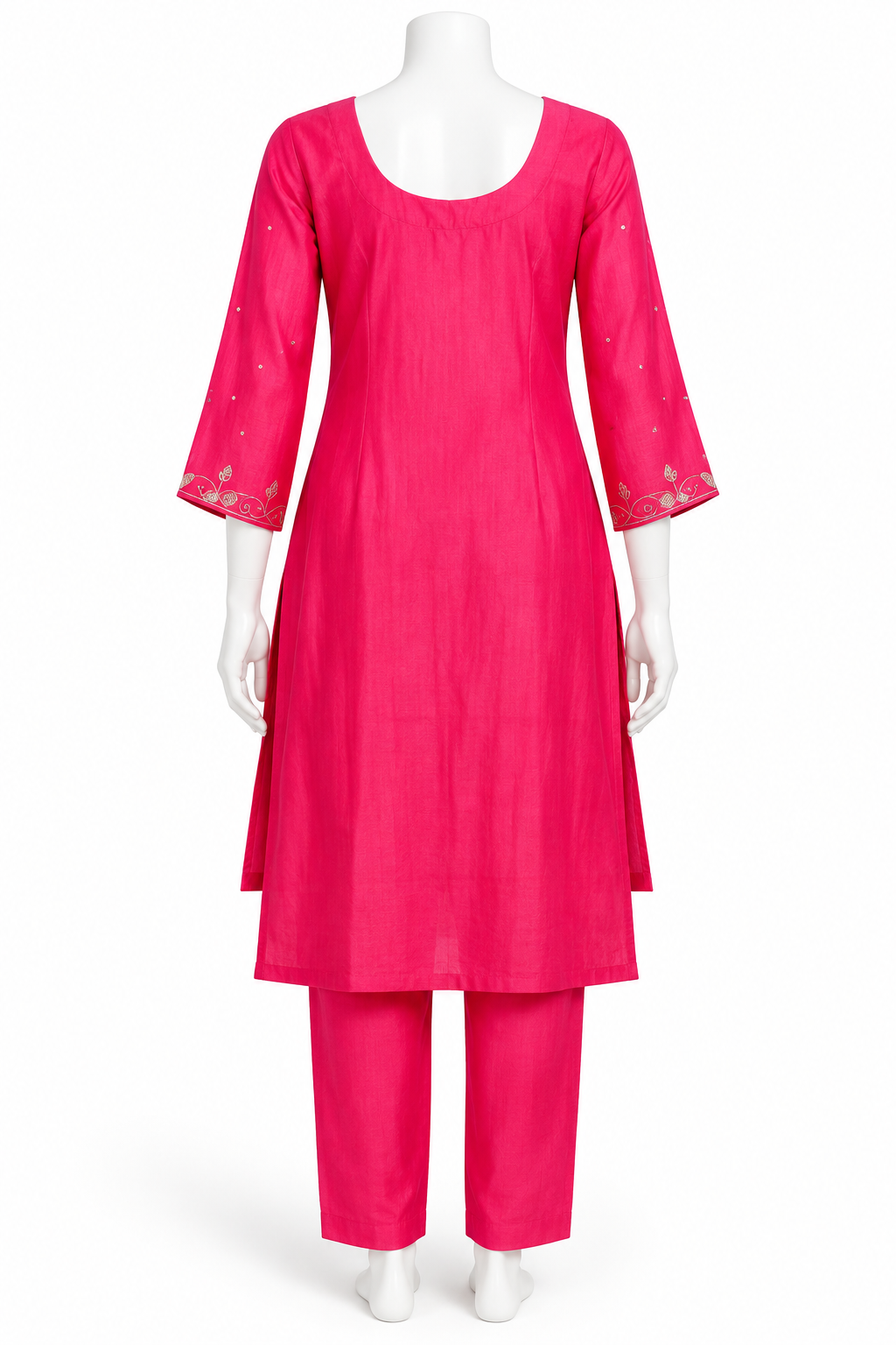A bright pink cotton kurta set with matching trousers displayed on a white mannequin against a plain white background.