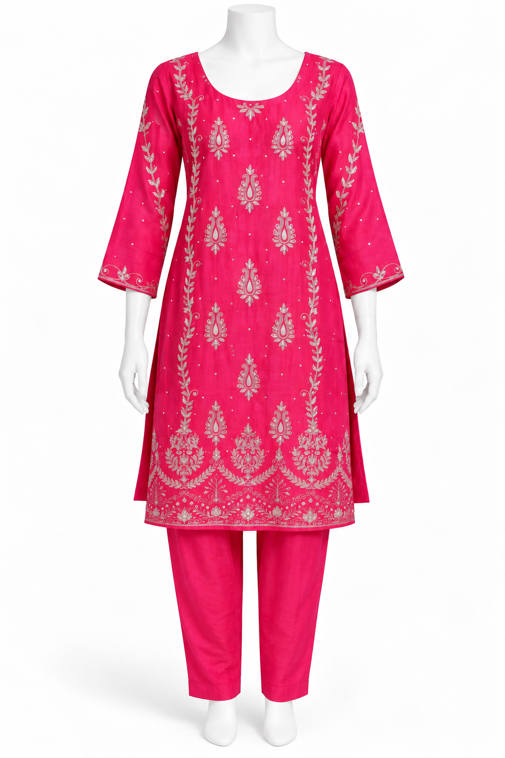 A bright pink traditional kurta set displayed on a white mannequin, featuring a heavily embroidered pink kurta with silver mirror-work and matching pink pants.