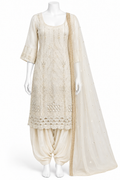An off-white/cream traditional Indian suit set displayed on a white mannequin, featuring a heavily embroidered kurta, matching harem pants, and a sheer embroidered dupatta.