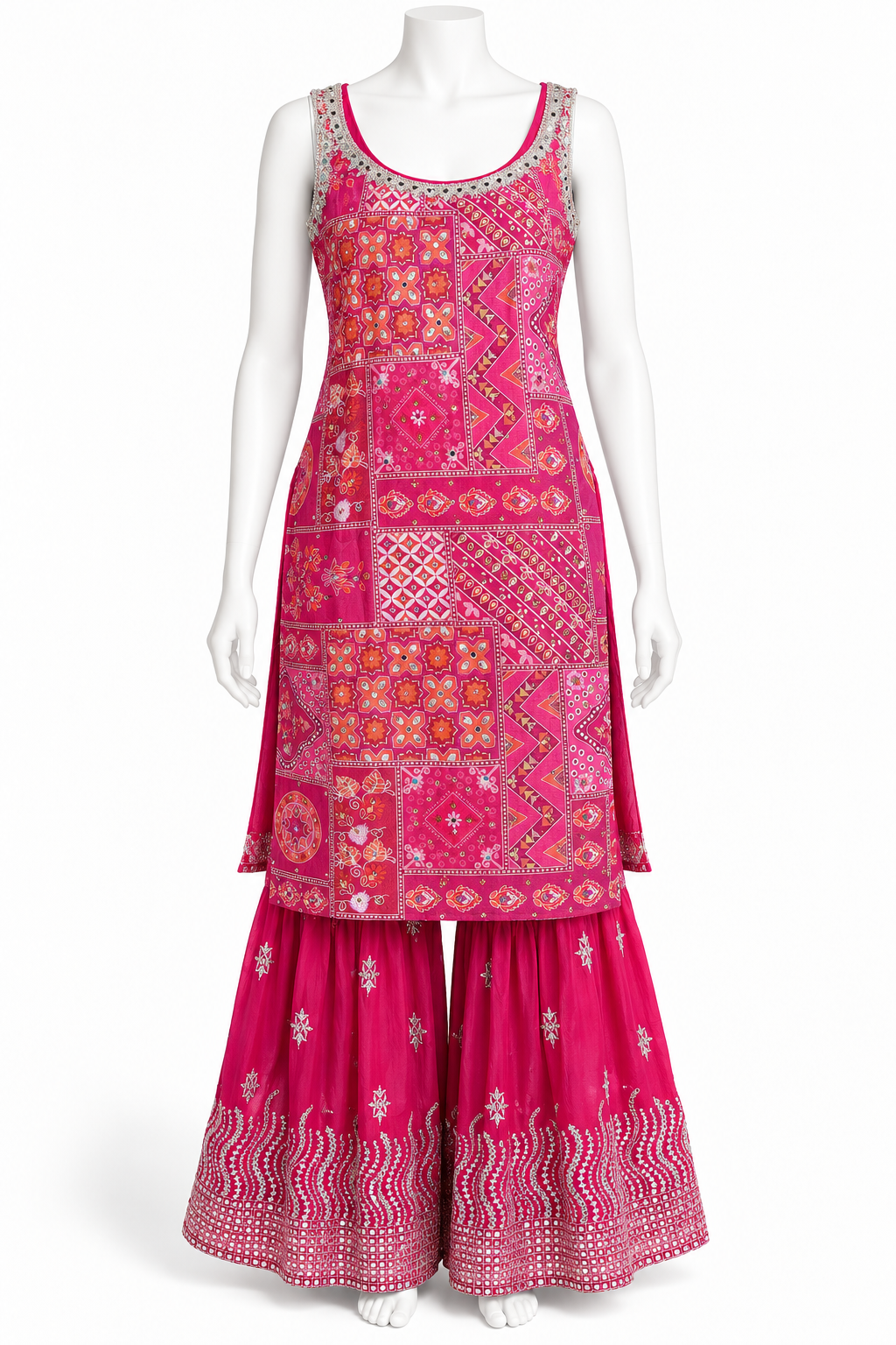 A sleeveless bright pink traditional outfit displayed on a white mannequin, featuring a heavily embroidered kurta with geometric and floral patterns in pink, orange, and white, paired with matching flared pants.