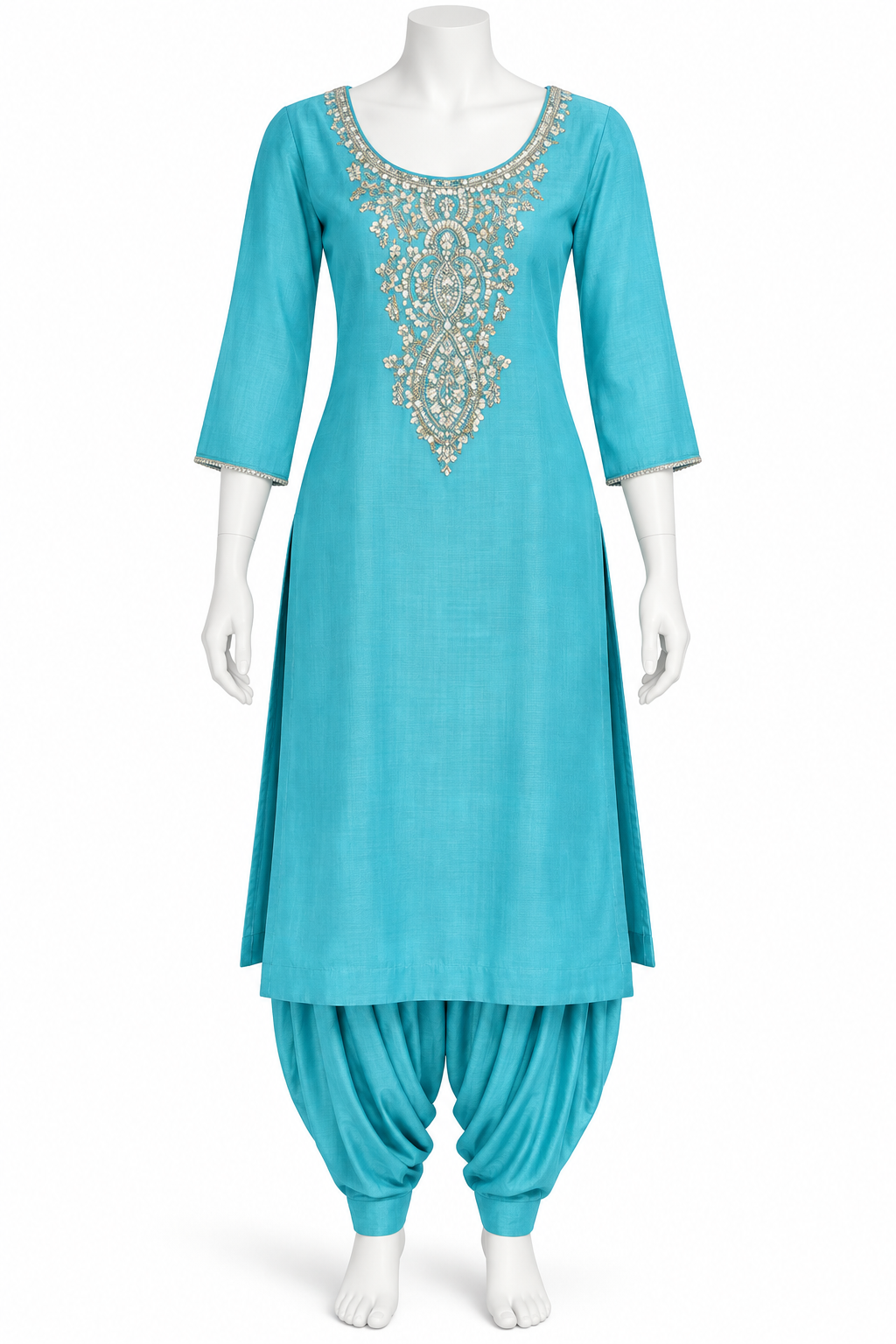 A turquoise blue kurta set displayed on a white mannequin, featuring a heavily embroidered neckline with gold and white details, paired with matching pleated patola pants.
