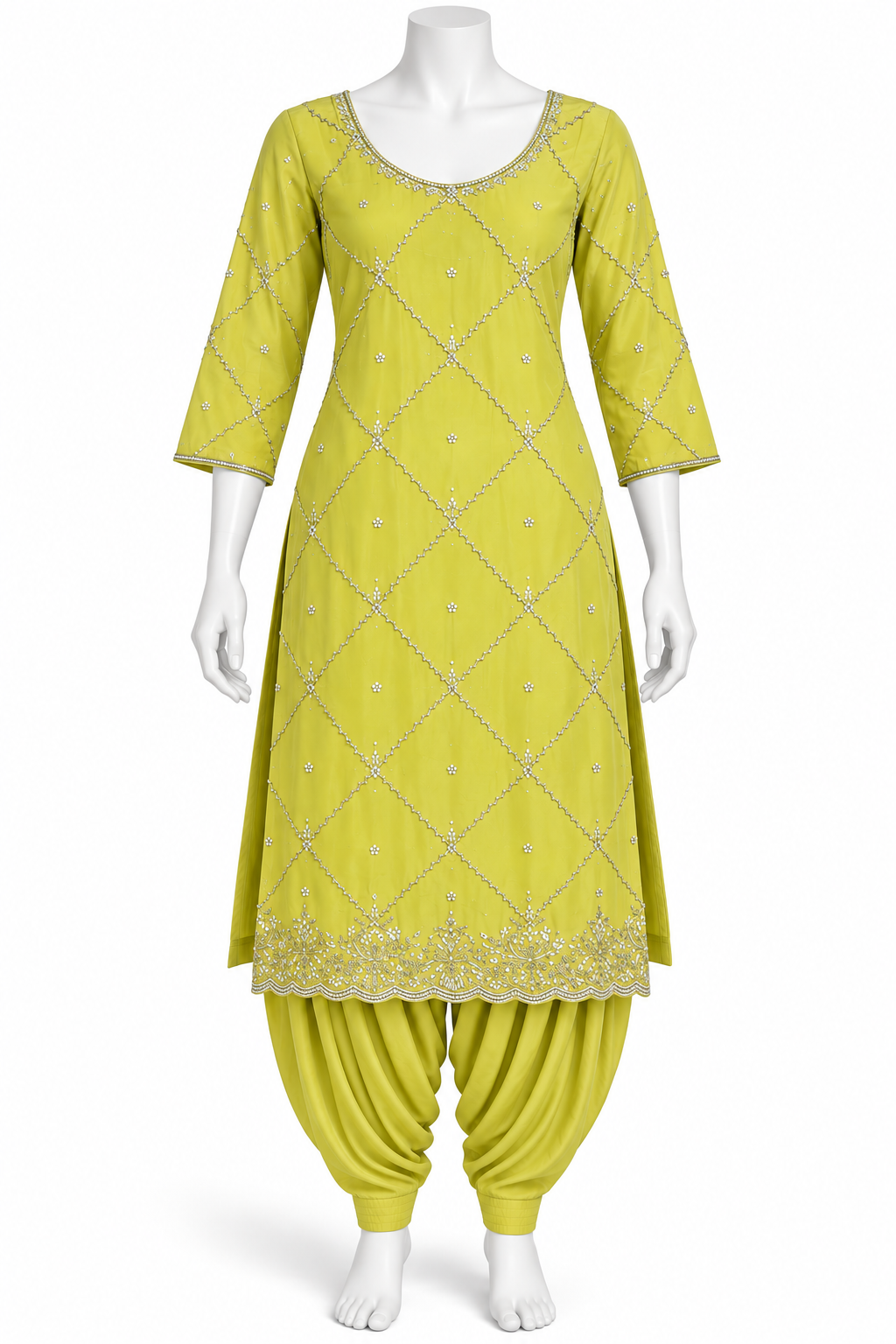 A three-piece Indian ethnic suit set displayed on a white mannequin, featuring a lime green kurta with silver embroidery, matching harem pants, and a coordinating belt.