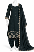 A three-piece black ethnic suit set displayed on a white mannequin, featuring a kurta with gold embroidery, matching patola pants, and a dupatta with a scalloped border.