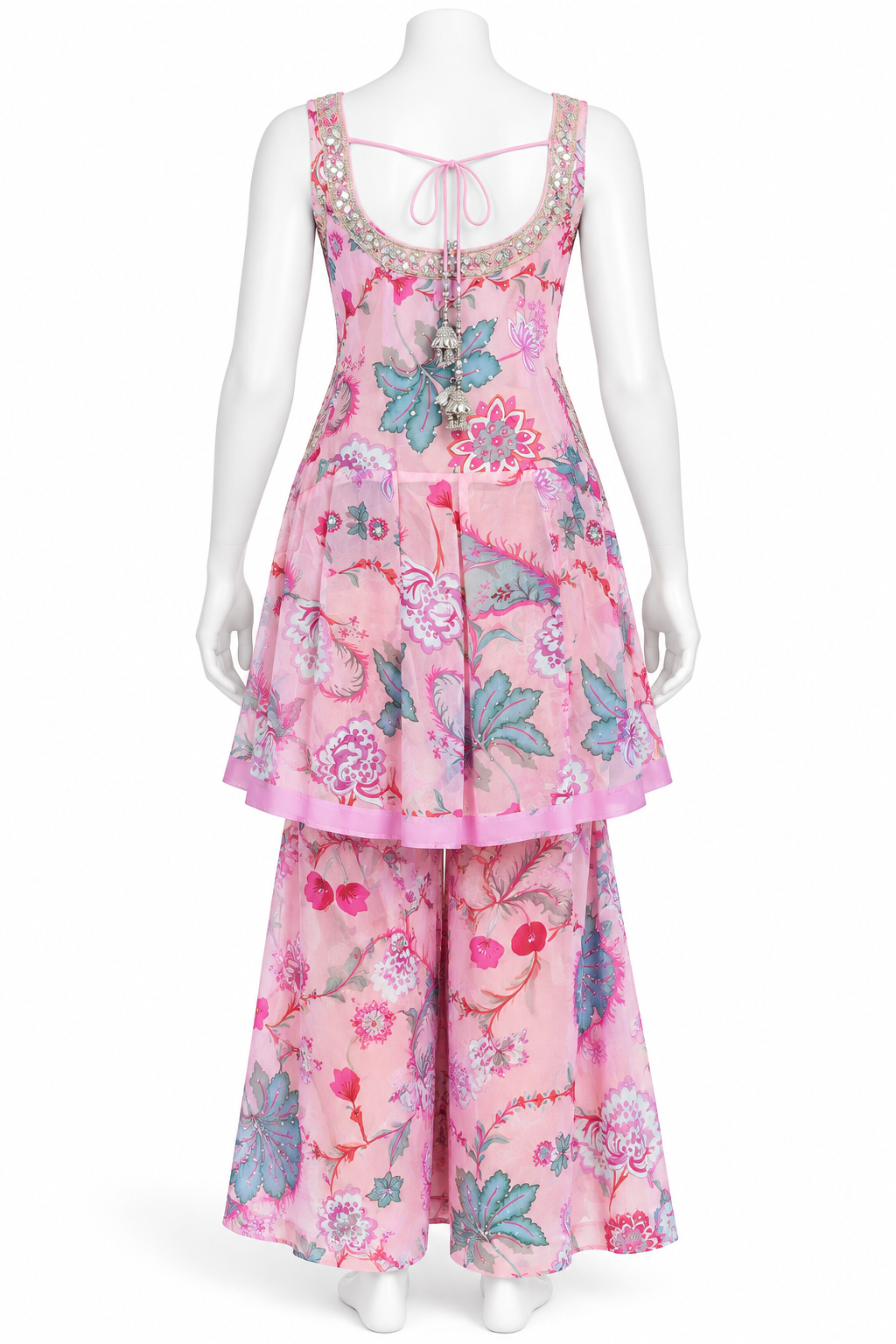 A pink floral two-piece set displayed on a white mannequin, featuring a sleeveless top with a tie neckline and matching wide-leg pants.