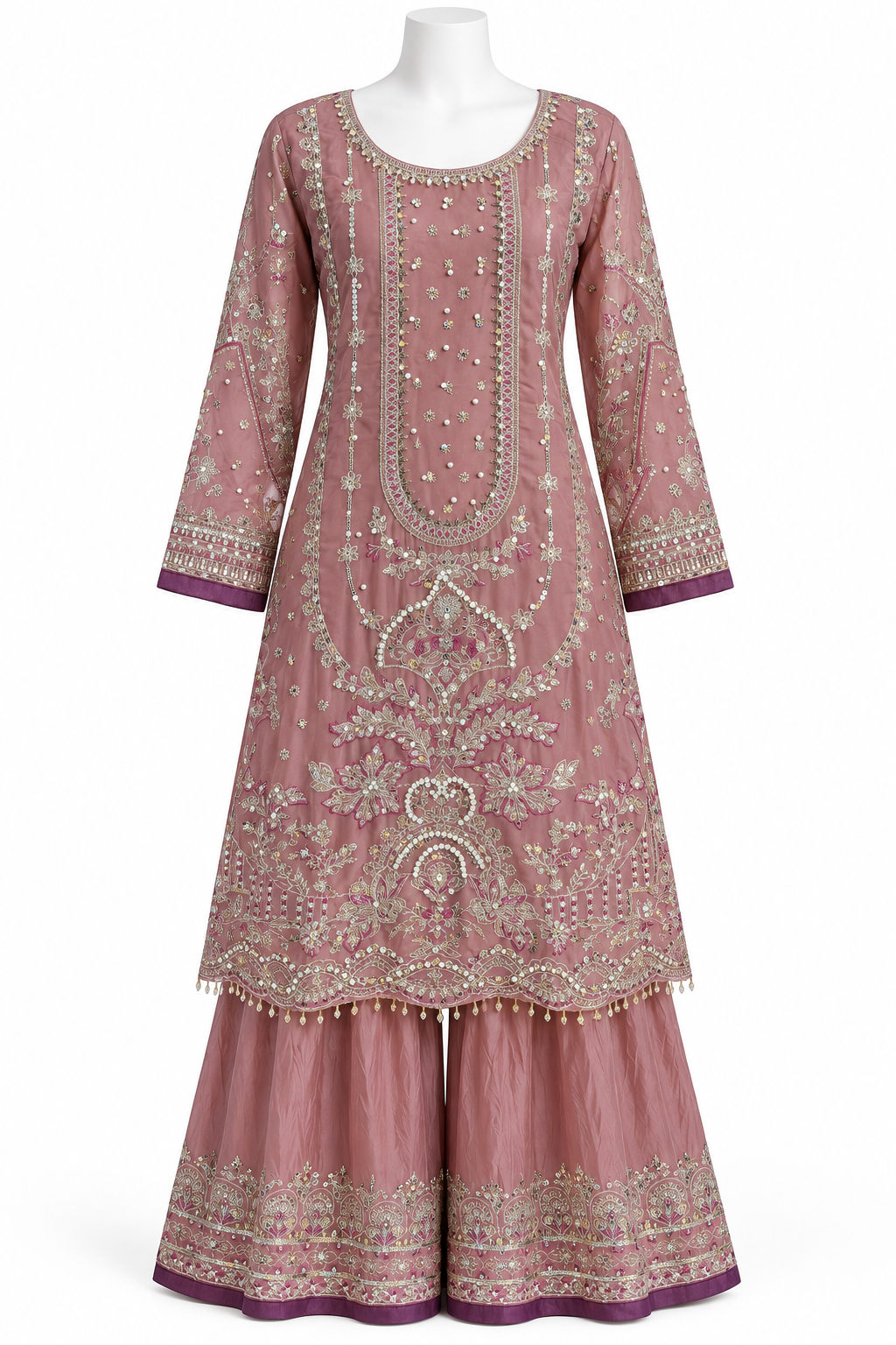 A dusty pink traditional Indian outfit with intricate silver and gold embroidery, displayed on a white mannequin against a plain white background.