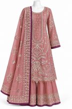 A pink traditional Indian outfit with intricate silver and gold embroidery, featuring a long kurta, matching flared pants, and a draped dupatta, displayed on a white mannequin against a white background.