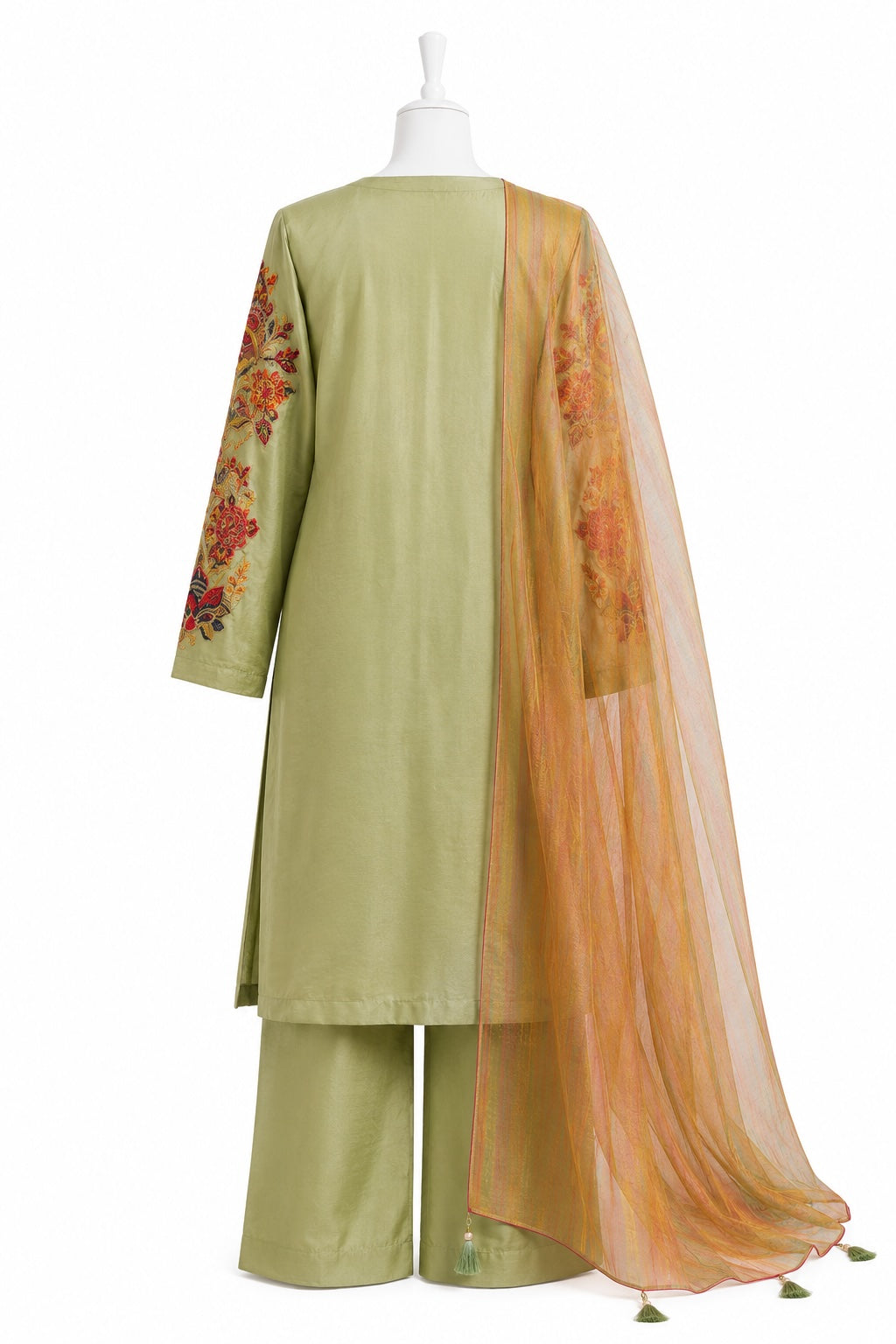 Green outfit with floral embroidery and orange dupatta on a white background