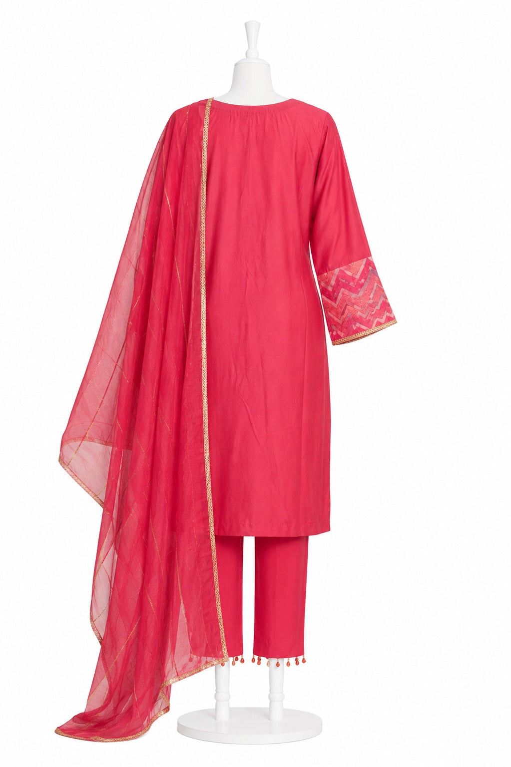 Pink traditional outfit with a dupatta on a white mannequin against a white background