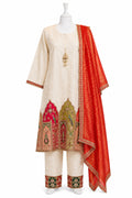 Traditional outfit with a cream kurta, red dupatta, and embroidered pants on a mannequin against a white background.