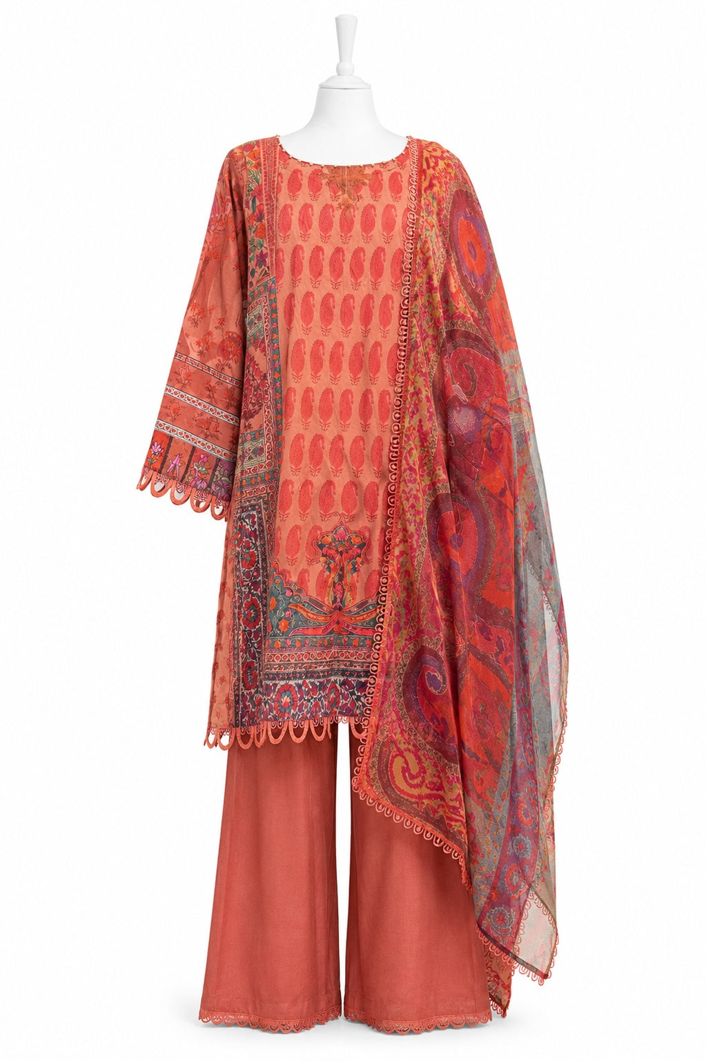 Traditional outfit with a red and orange patterned dupatta on a white background