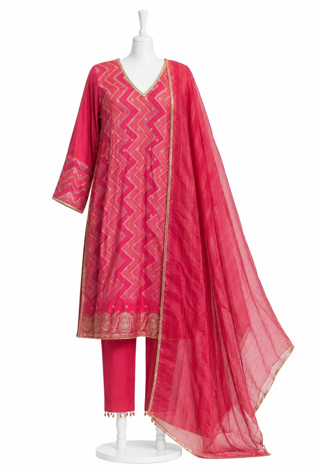 Pink traditional outfit with a matching dupatta on a mannequin against a white background