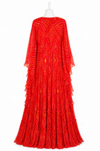 Red patterned dress on a white background