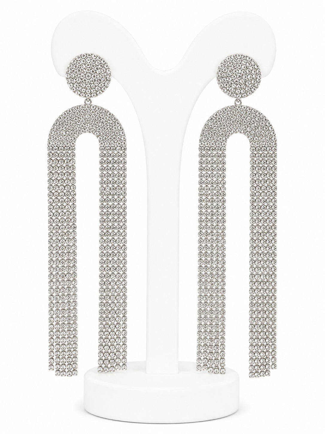 Pair of silver tassel earrings on a white background