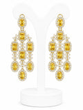 Pair of yellow gemstone chandelier earrings on a white background
