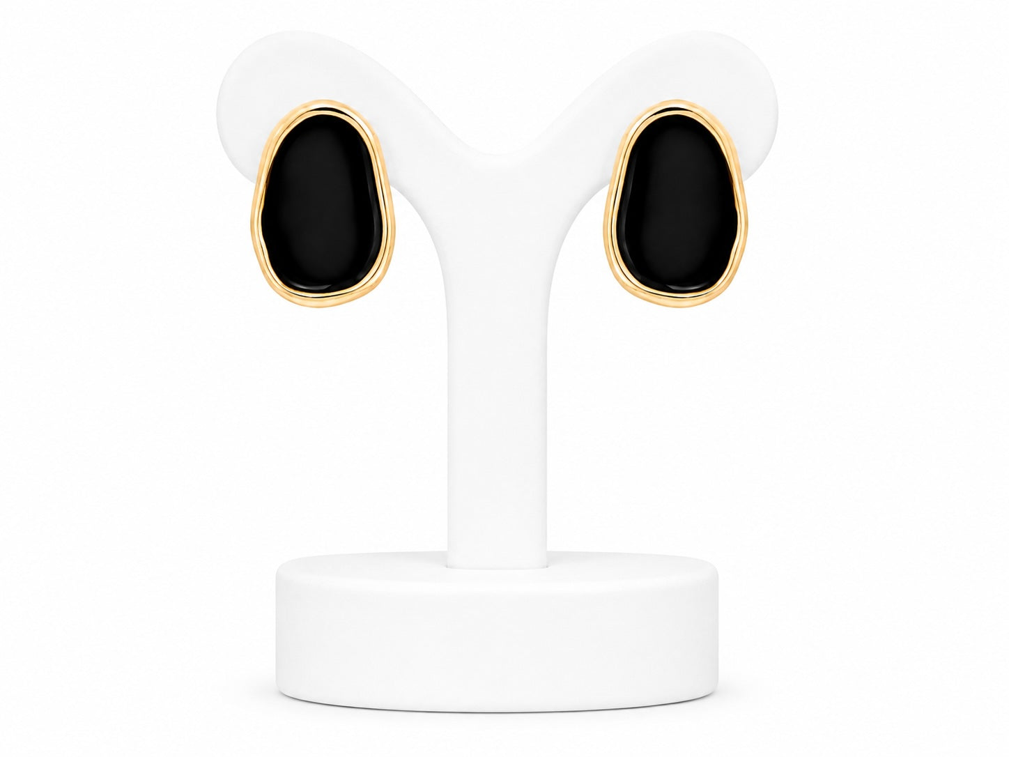 black and gold earrings on a white background