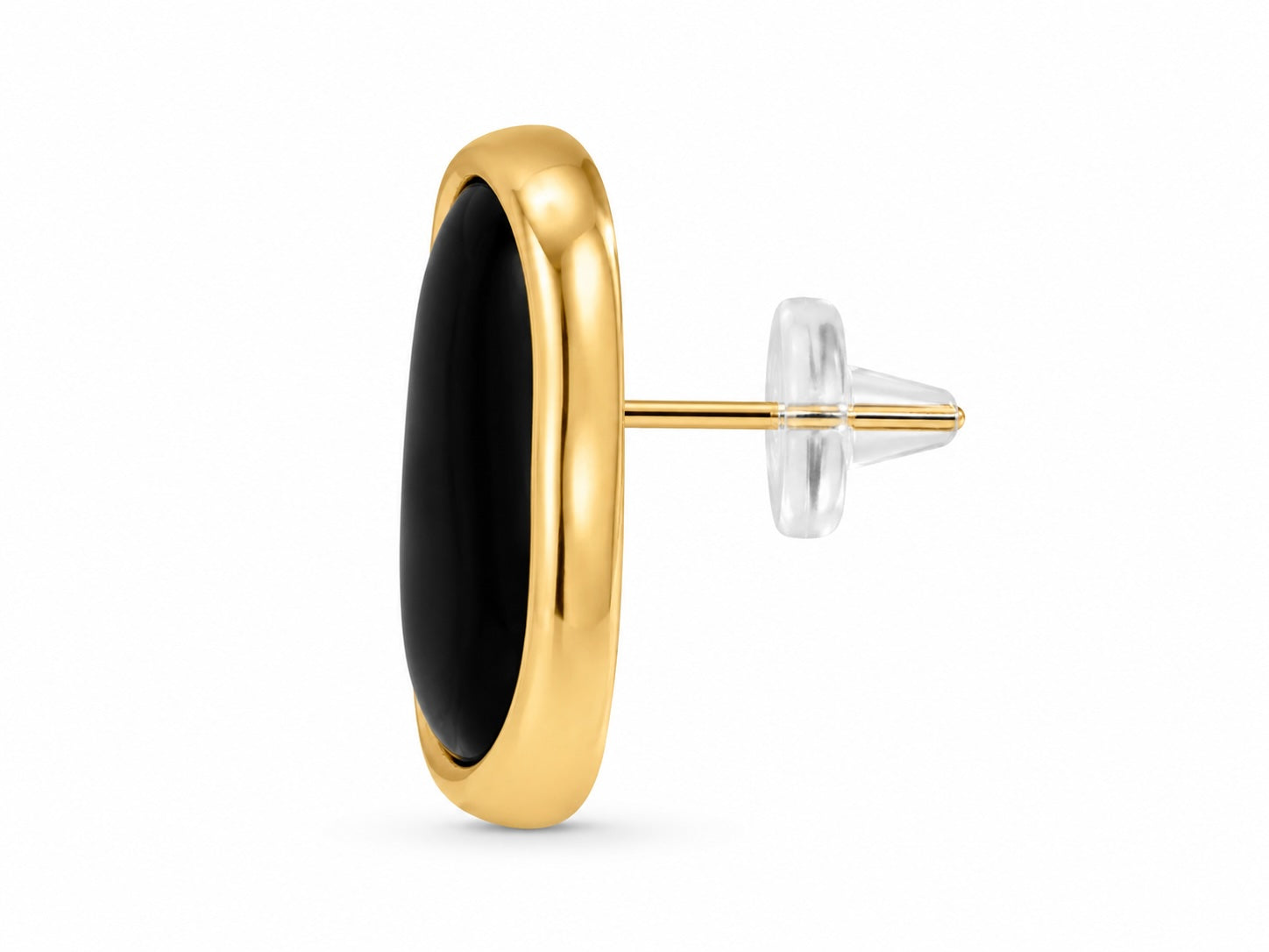 Gold earring with black stone on a white background