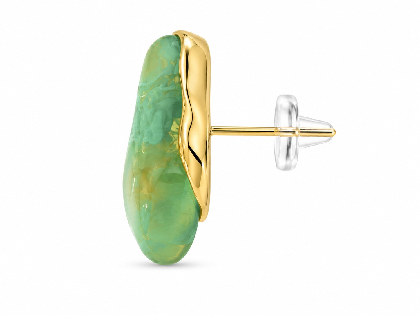 Gold and green earrings on a white background