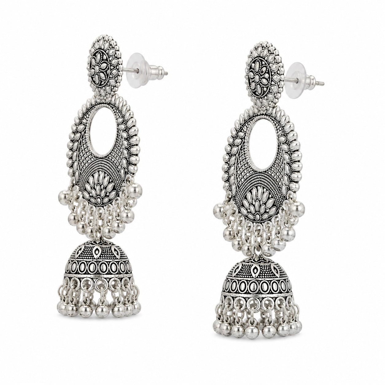 Pair of silver jhumka earrings on a white background
