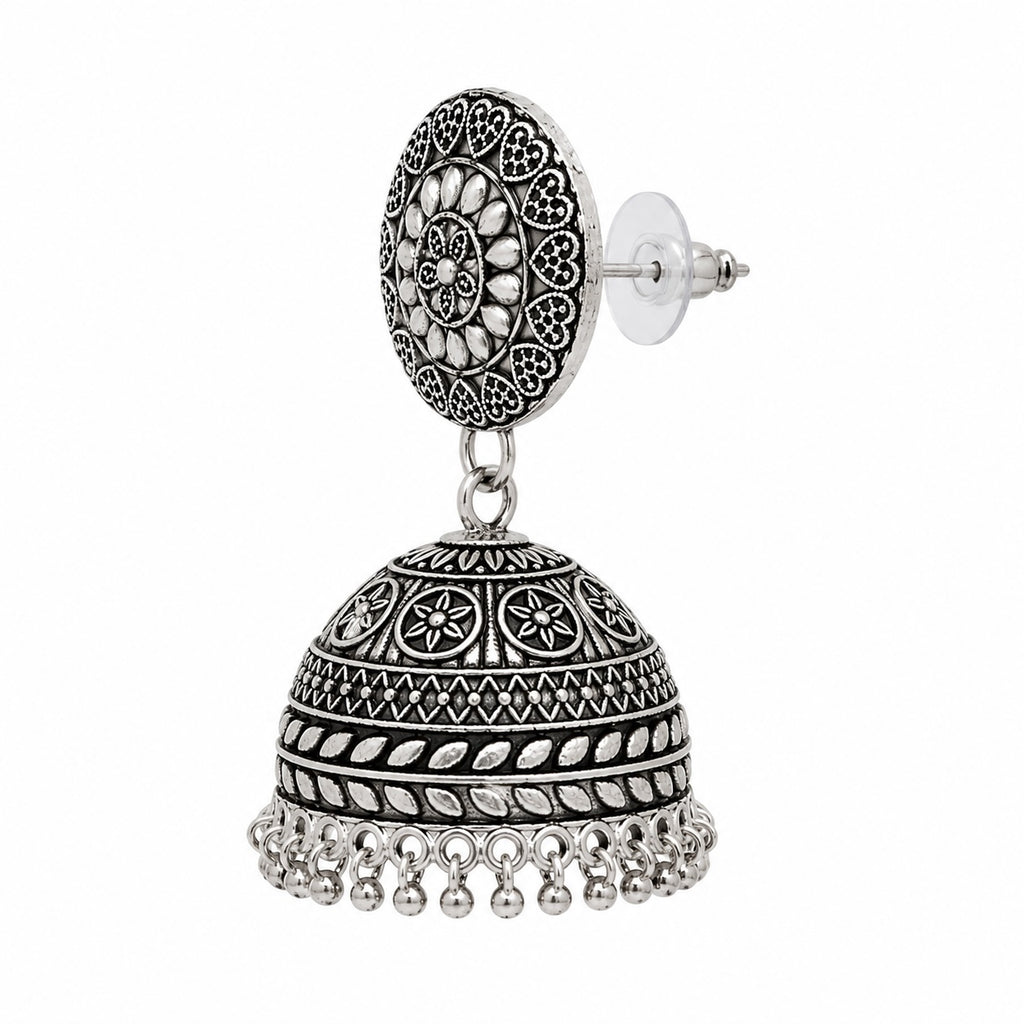 Silver jhumka earring on a white background