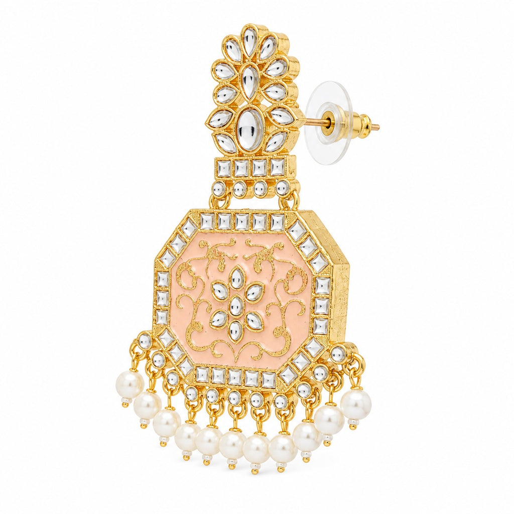 Ornate earring with gold, pink, and pearl details on a white background