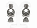 Pair of silver earrings with intricate designs on a white background