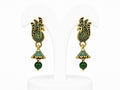 Pair of gold and green earrings on a white background